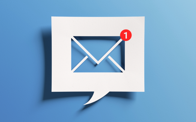 Over a light blue background, a floating text bubble contains an image of a letter inside with a red notification bubble in the upper right hand corner (i.e., an email notification icon).